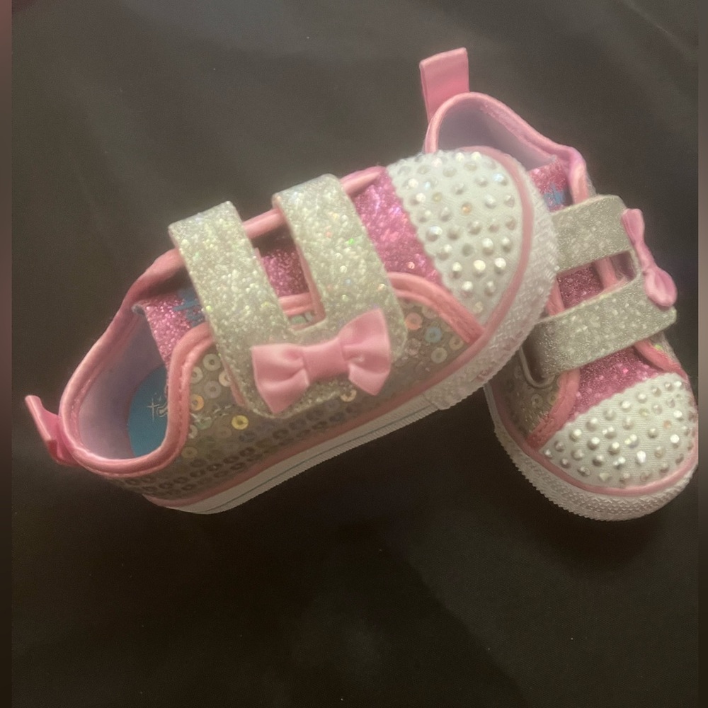 The shoes light up with movement.